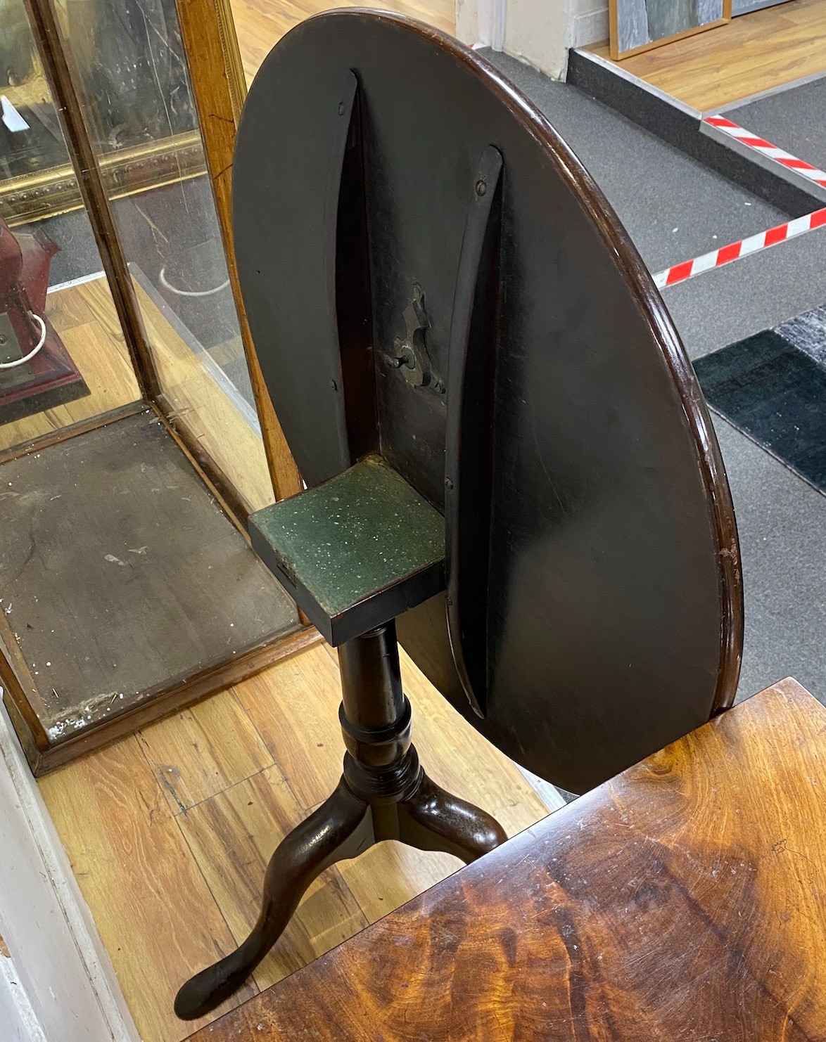 A George III mahogany tilt-top tripod table, diameter 72cm